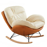 upholstered rocking chair on porch